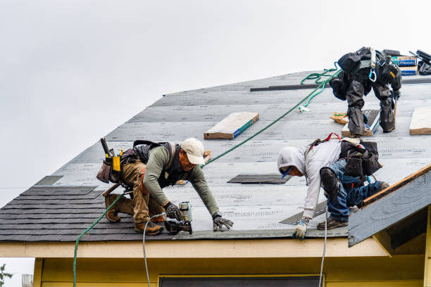 Professional Gutter Installation technician working in Marion, NY